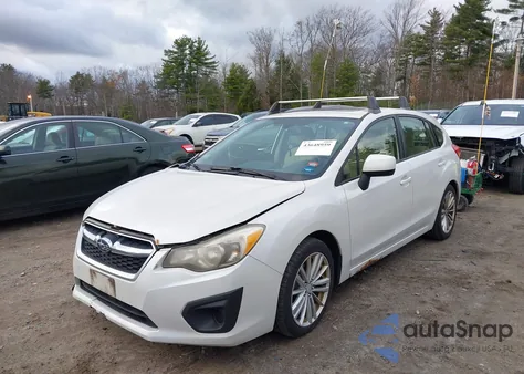 2012 Subaru Impreza 2.0I Premium z USA, uszkodzony, nr VIN JF1GPAD61CH233542